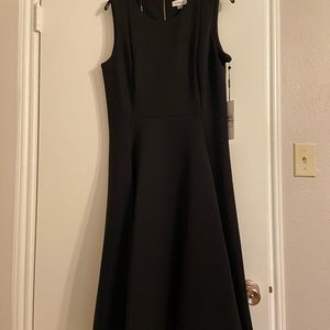 Calvin Klein never worn simple black flare dress